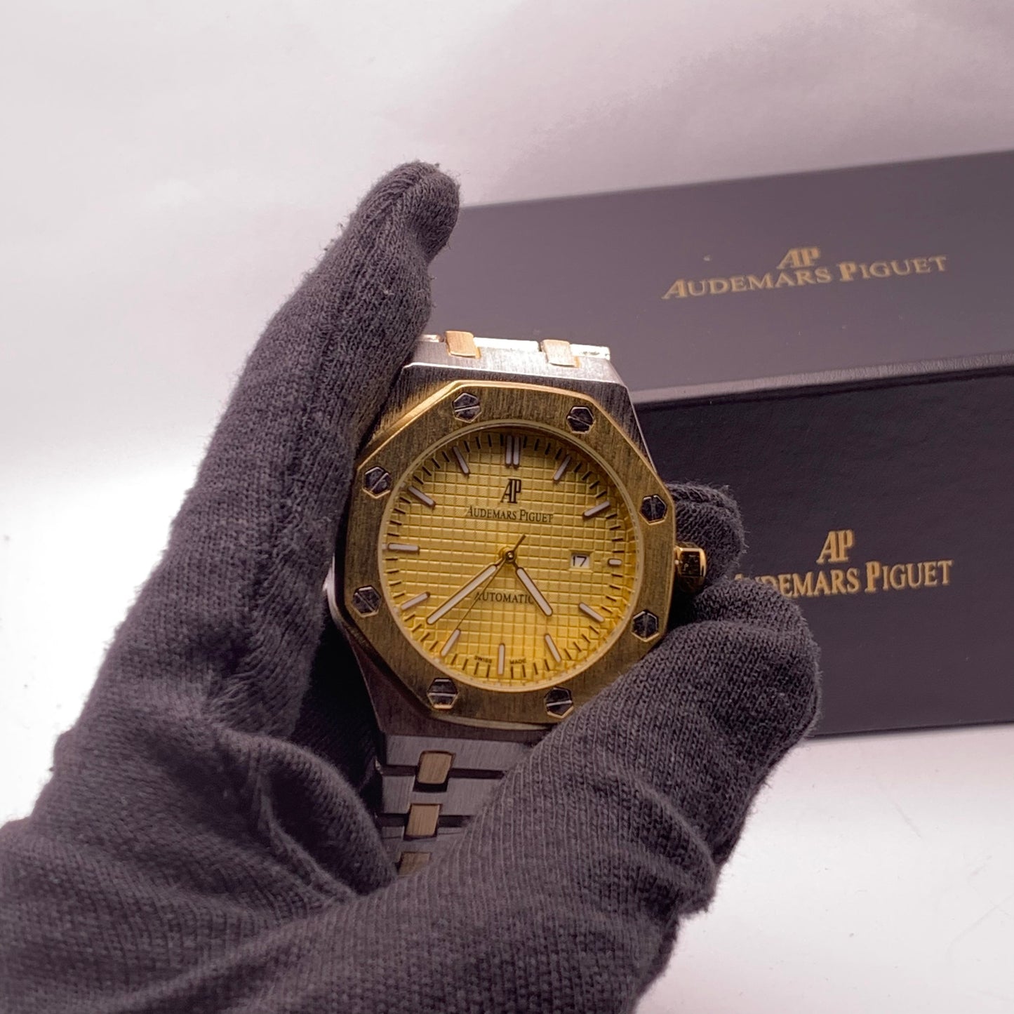 Audemars Piguet Silver Chain Golden Dial Luxury Watch